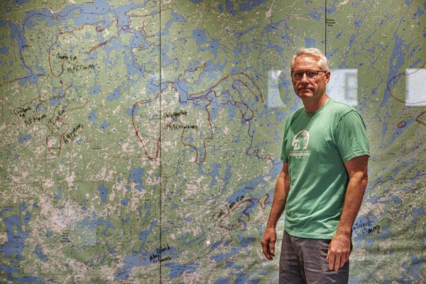 Jason Zabokrtsky, owner of Ely Outfitting Co., poses