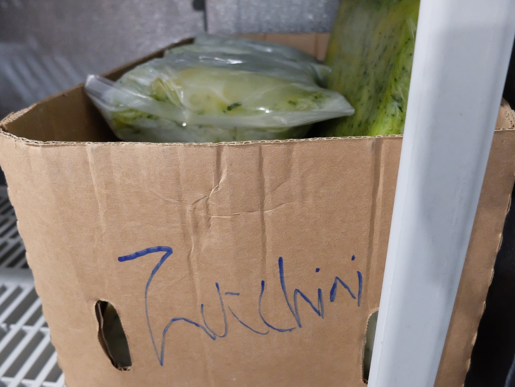 Holdingford schools stores boxes of cabbage, celery and zucchini.