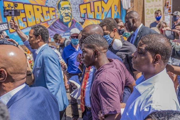 Quincy Mason Floyd, son of George Floyd, makes his way to the memorial site outside of Cup Foods on Wednesday, June 3, 2020, in Minneapolis, where his father died while in police custody.