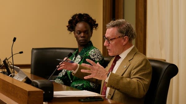 State Rep. Danny Nadeau, R-Rogers, (right) presents a bill to the House and Human Services Committee 
