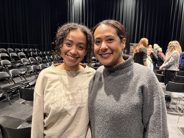 Natalie Jones, 48, and her daughter Yezi Gugsa, 23, attended the community vigil Monday night at the Rochester Civic Theatre.