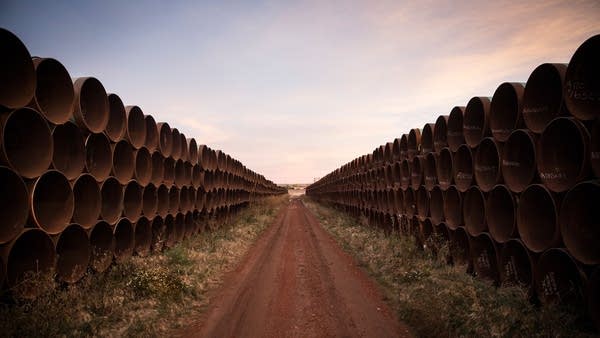 Miles of unused pipe, prepared for the proposed Keystone XL pipeline, sit in a lot on Oct. 14, 2014 outside Gascoyne, N.D.