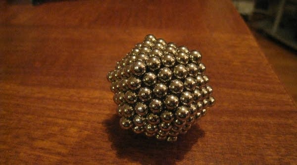 The Consumer Product Safety Commission says children are choking on buckyballs, the magnets seen above, and has filed a complaint.