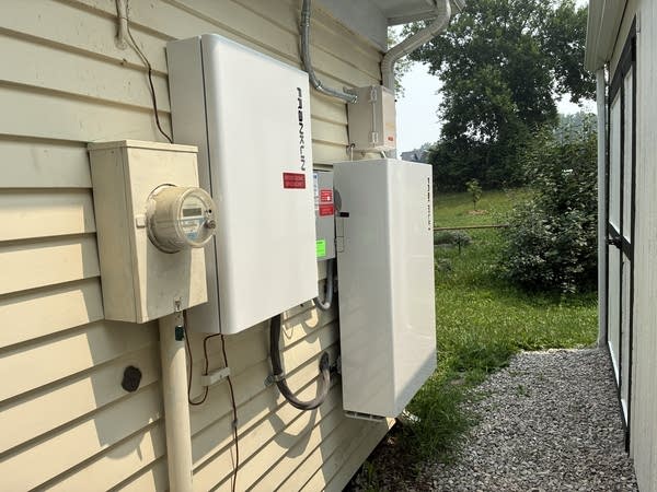 A white battery about as tall and wide as a mini refrigerator supplies enough power for a home to stay operating for more than a day, provided the homeowner doesn't keep running the air conditioning.