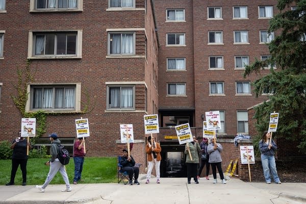 People walk a picket line