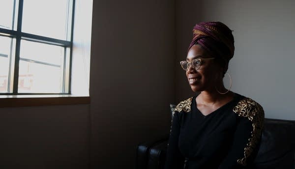 Me'Lea Connelly sits for a portrait in her office in North Minneapolis