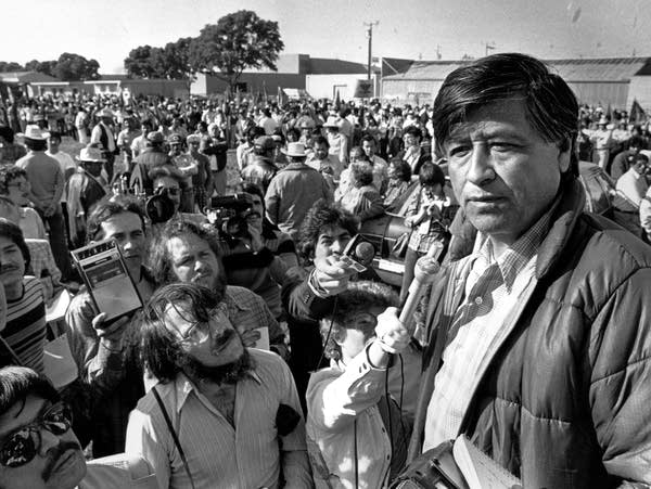 A man speaks to striking farmworkers
