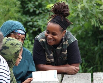 Amber Hill, right, smiles as Amitri Hosea finds answers during a quiz.