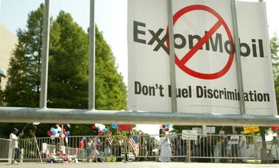 An sign at the annual Exxon shareholder's meeting