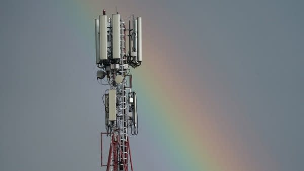 A mobile phone network tower stands near a rainbow on July 16, 2020 in Poznan, Poland.