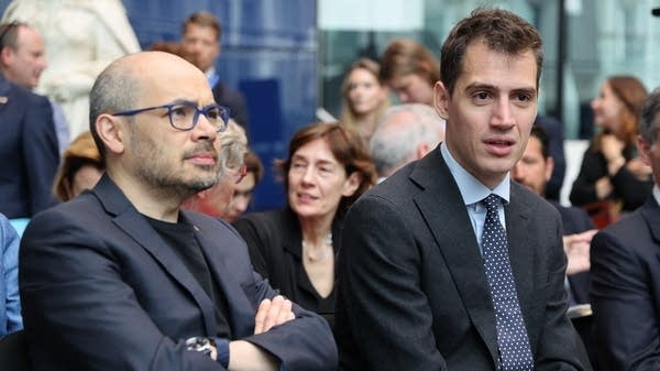 CEO of DeepMind Technologies Demis Hassabis (left) and founder and CEO of Mistral AI Arthur Mensch (right) attend an AI summit at Imperial College London in July.  