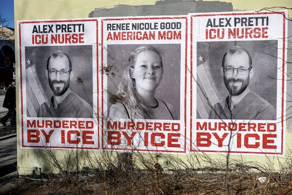 Posters depicting Alex Pretti and Renee Macklin Good are pasted on a wall