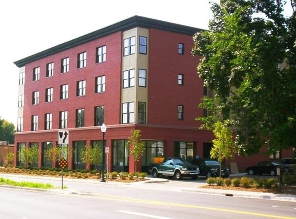 A red brick apartment building.