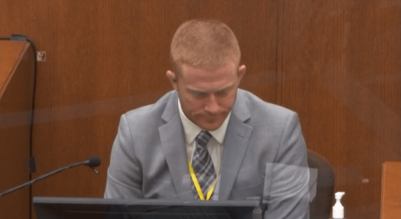 A man testifies during a trial.