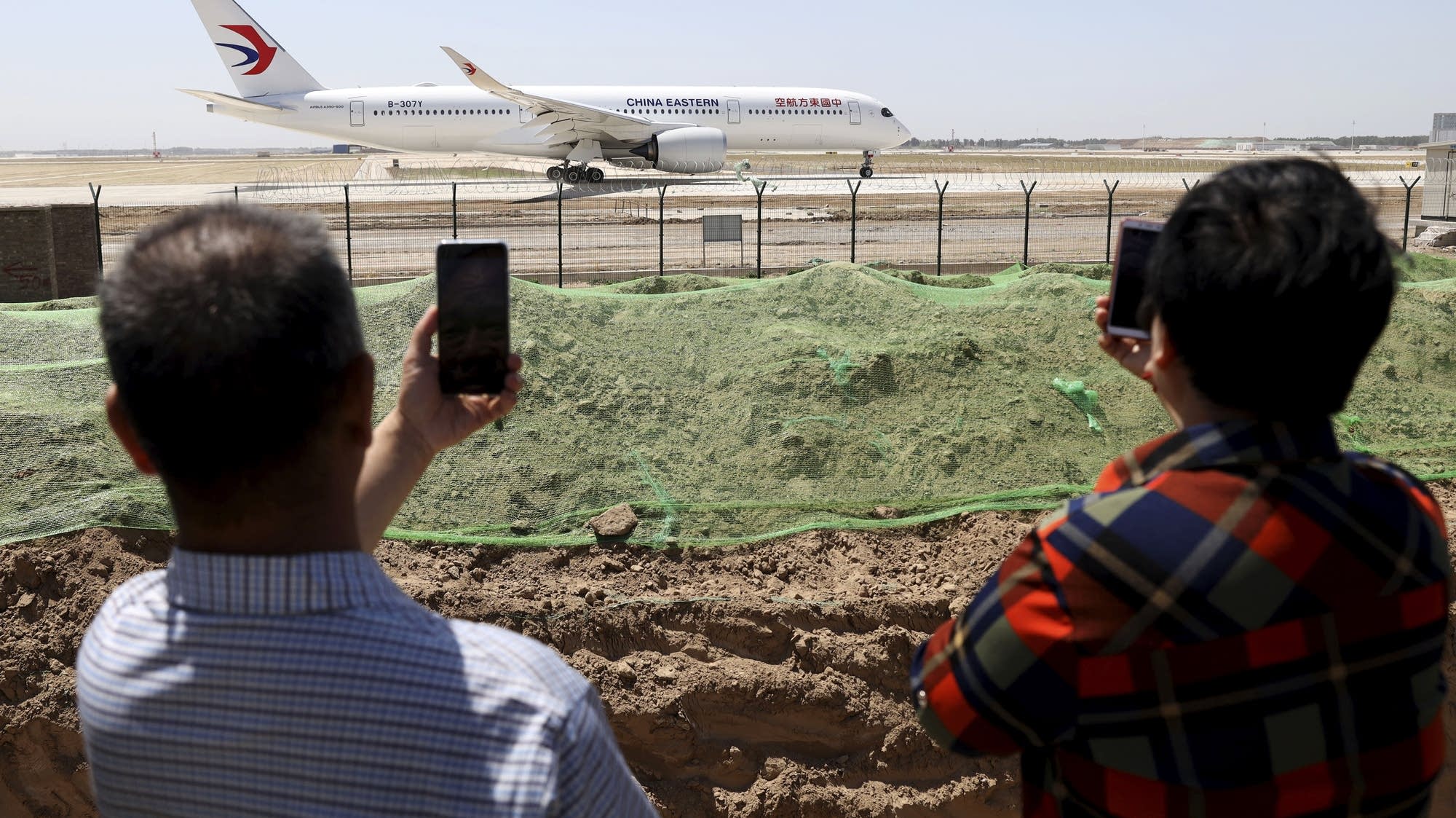 Chinese Airliner Crashes With 132 Aboard In Country s South MPR News