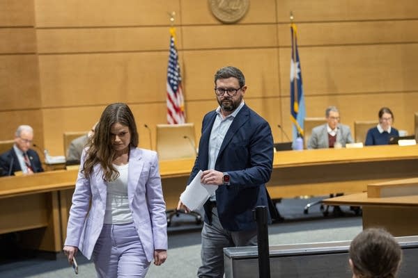 Two people during a hearing