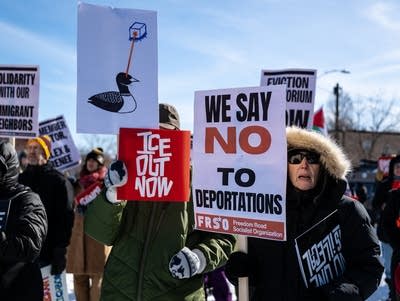 Protesters gather during a rally