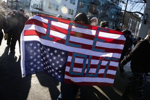a person holds a flag