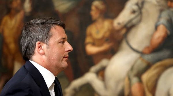 Italian Prime Minister Matteo Renzi leaves Palazzo Chigi after giving a speech about the results of the referendum on constitutional reforms on December 5, 2016 in Rome, Italy. 
 