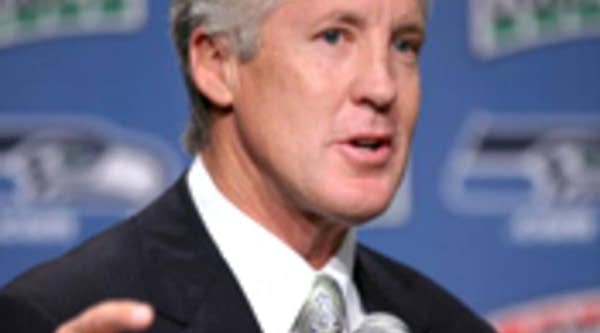 Former University of Southern California head coach turned Pete Carroll discusses his new position as head coach for the Seattle Seahawks at a press conference.