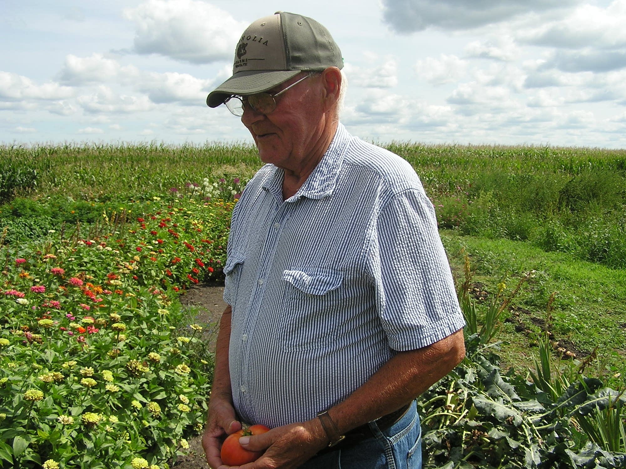 Dennis Stelter stands in his garden