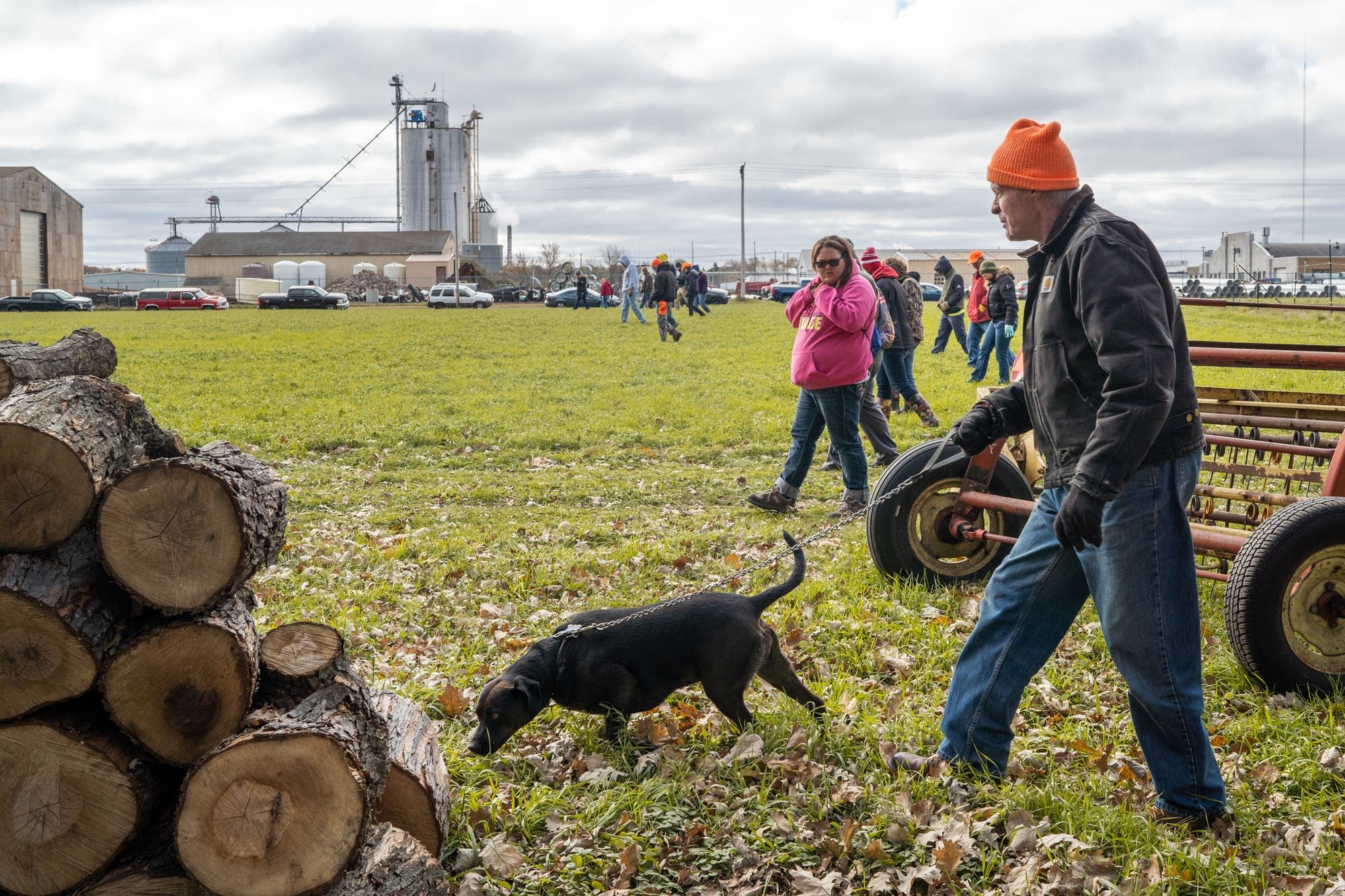 Tim Collins of Shoreview, Minn. searches for evidence with his dog