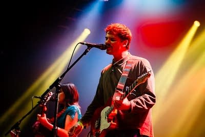 the band chutes performing on stage