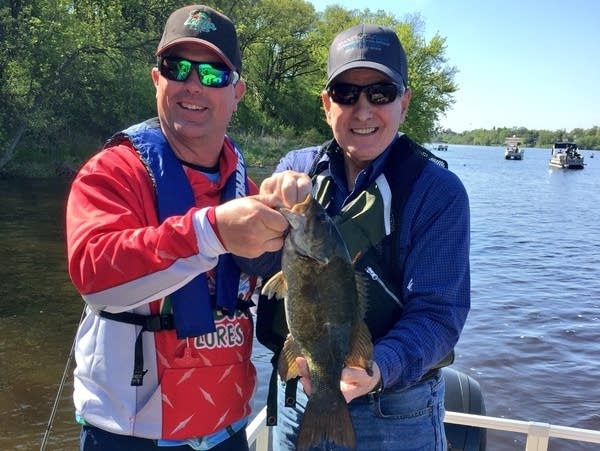 Governor Dayton (R) shows off a 17.5-inch smallmouth bass.