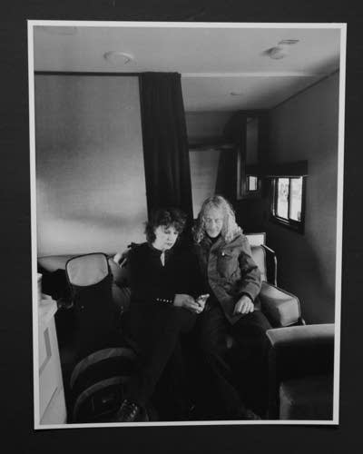 A photograph of a woman and a man sitting close together