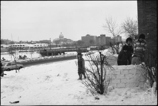 Playing in the snow outside Liberty Plaza