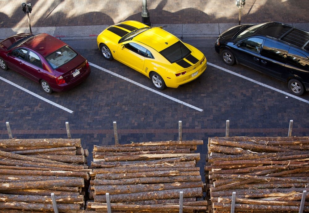 Truck, parked cars