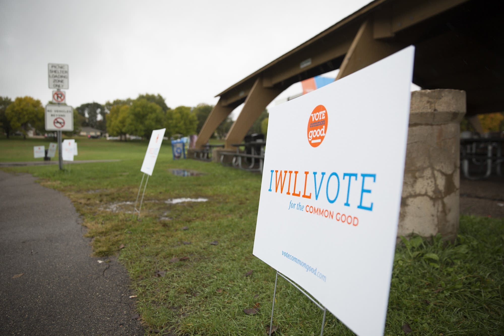 Signs for Vote Common Good sit outside at Veterans Park in Richfield.