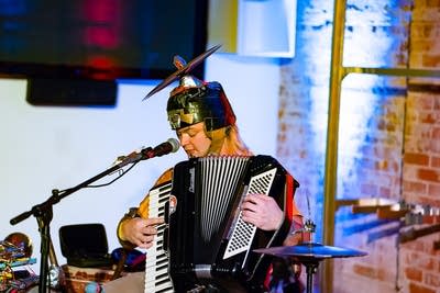 one person band performing on stage