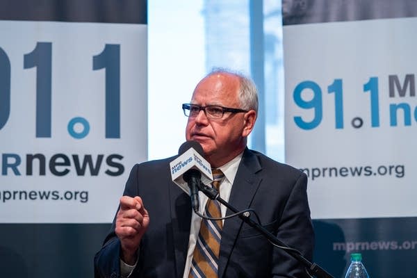 U.S. Rep. Tim Walz answers a question during a debate.