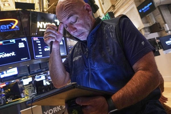 Wall Street holds steady following mixed profit reports from McDonald’s, Disney and Shopify