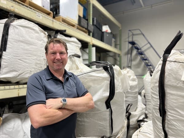 man standing in front of hemp 