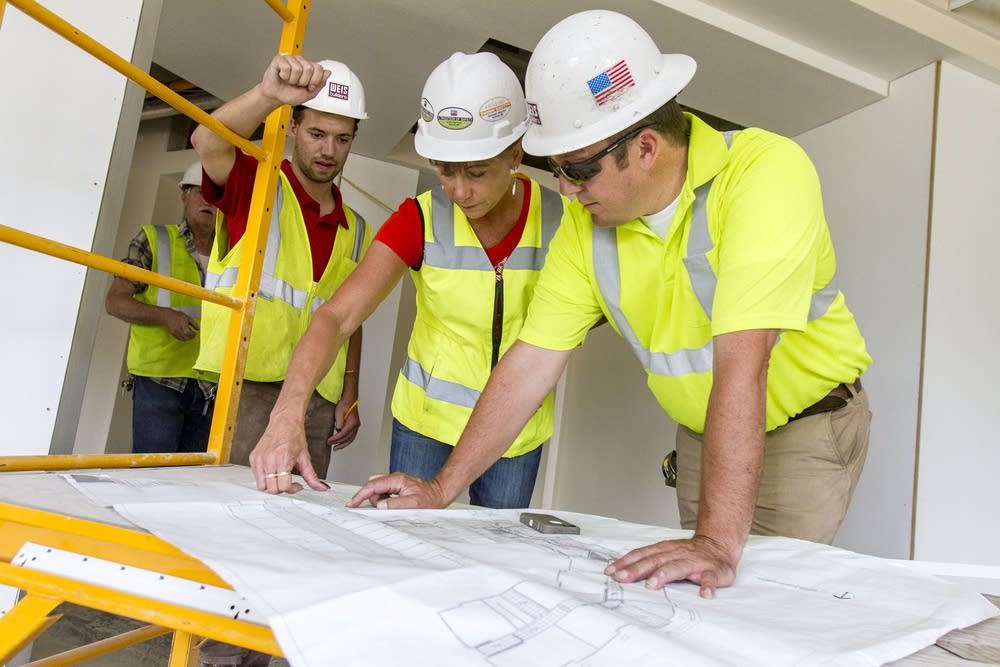 Going over building plans