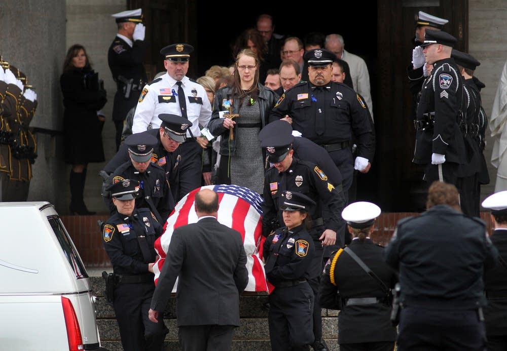 Casket leaves funeral