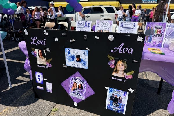 A poster board memorial for two students