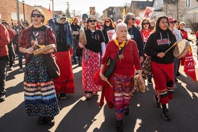 People walk in the street for a march