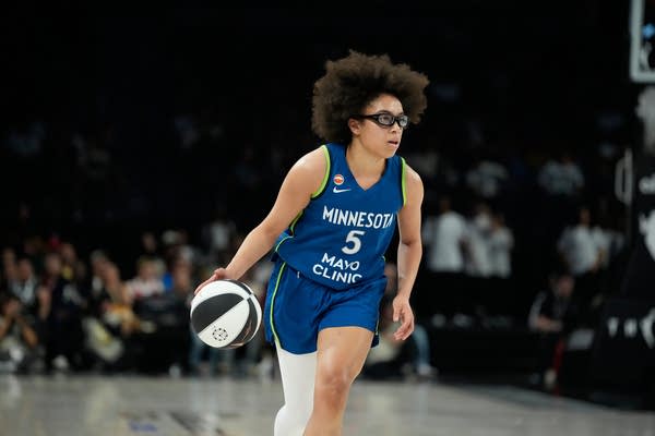Minnesota Lynx guard Olivia Miles dribbling