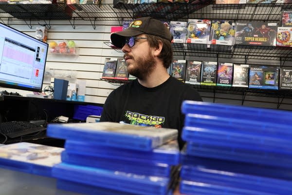 A man going through video games