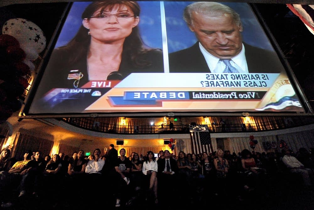 Democratic supporters watch the debate
