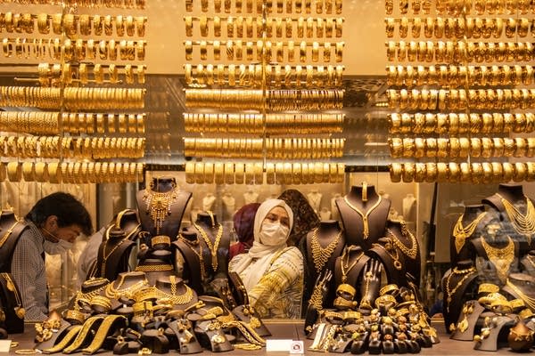 Gold hits another record high amid concerns of a slow recovery from the coronavirus health crisis. 