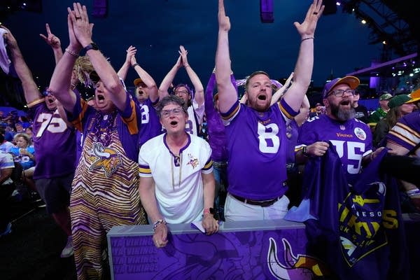 Minnesota Vikings fans cheer during the NFL Draft