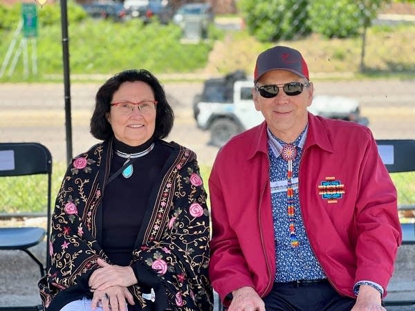 Two people pose for a photo