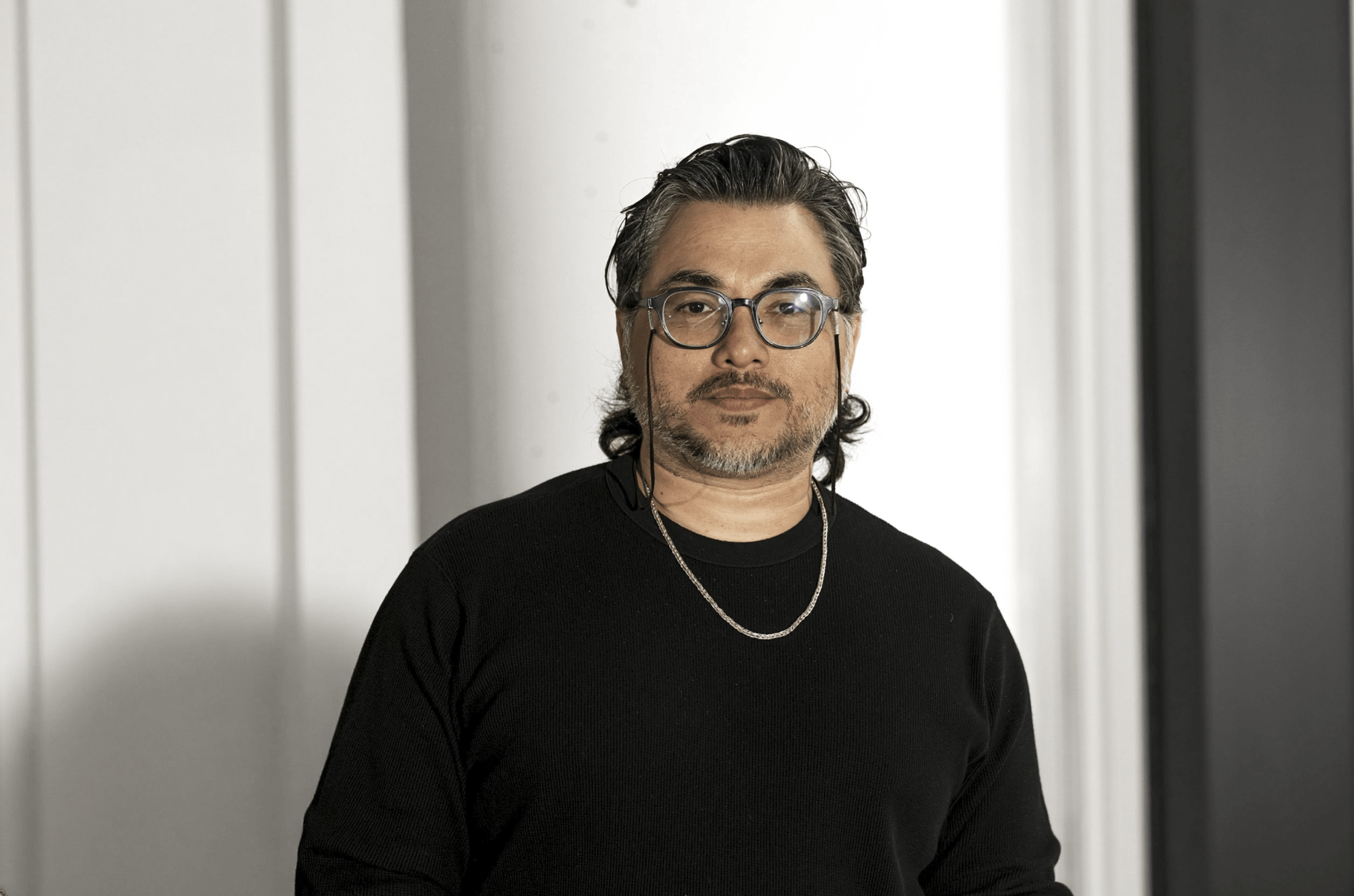 a man poses for a photo