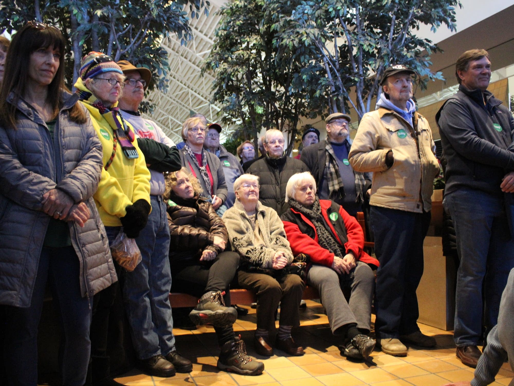 A crowd listens to U.S. Sen. Amy Klobuchar speak