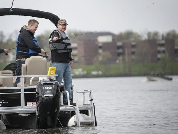 Gov. Tim Walz casts on Fountain Lake in Albert Lea