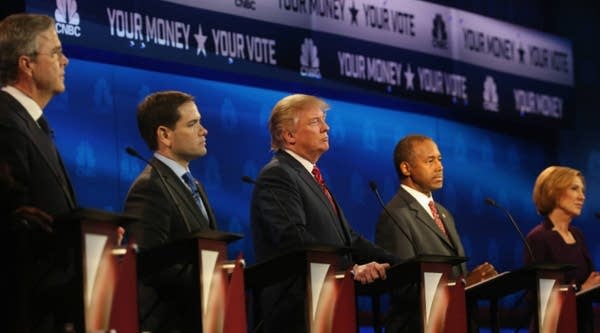 Presidential candidates look on during Wednesday's Republican presidential debate. 